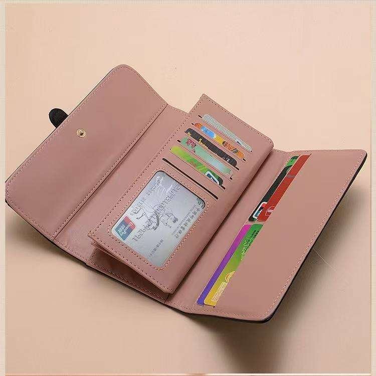 Compact bag and accessories flat lay showing trim and construction details